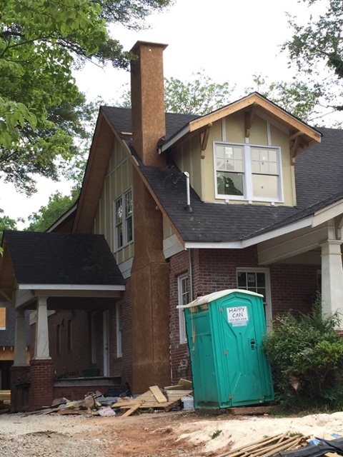 A chimney/dormer, valley arrangement that could create water management problems