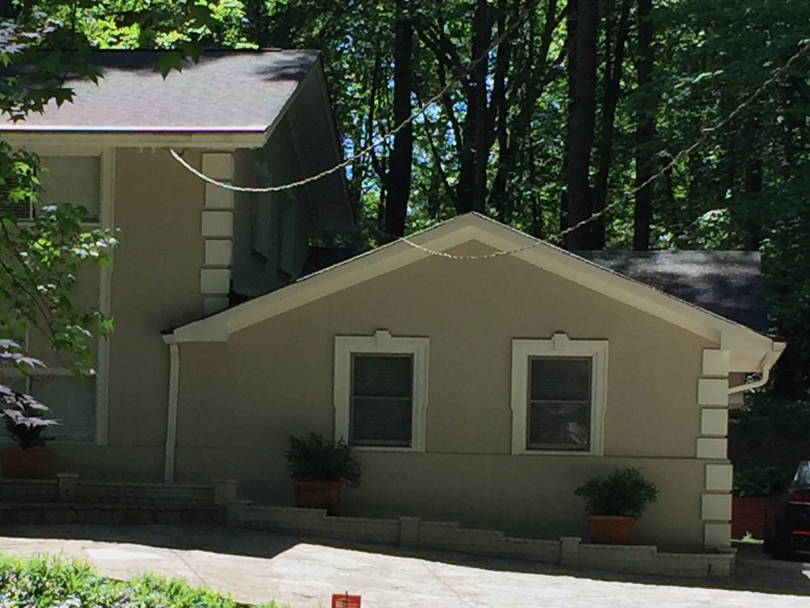 A dead valley created by a garage butted up against the house