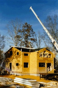 SIP structural insulated panels being installed in roof