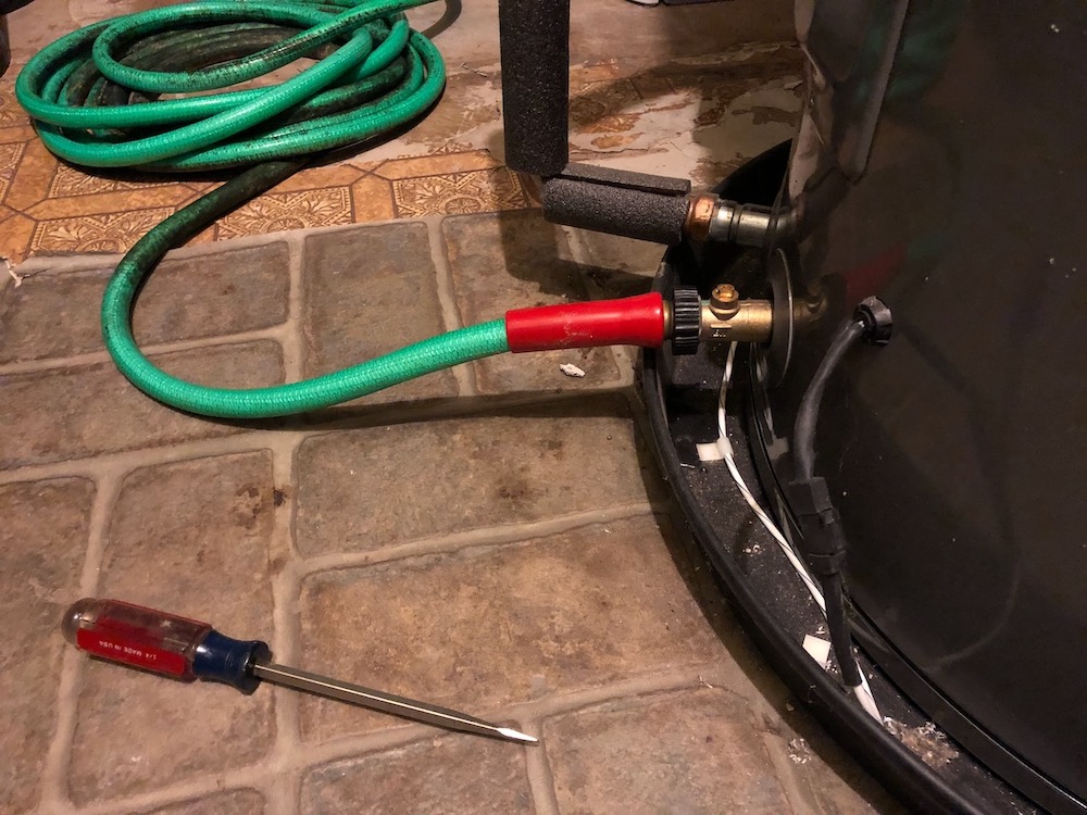 Draining a water heater regularly helps keep it free of tank-killing sediment