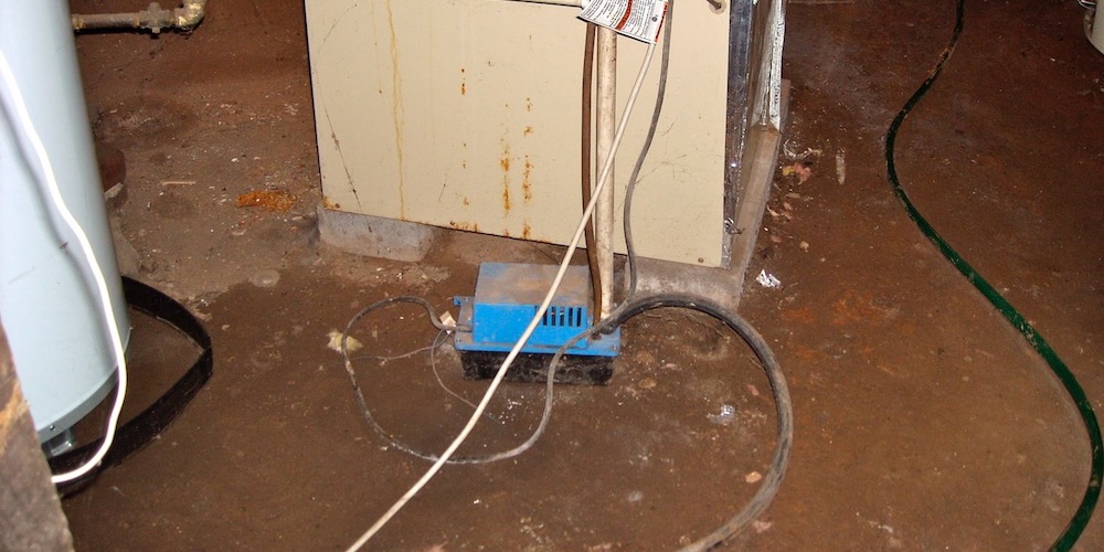 The wet soil in this vented crawl space is uncovered, allowing a lot of water to evaporate into the crawl space air